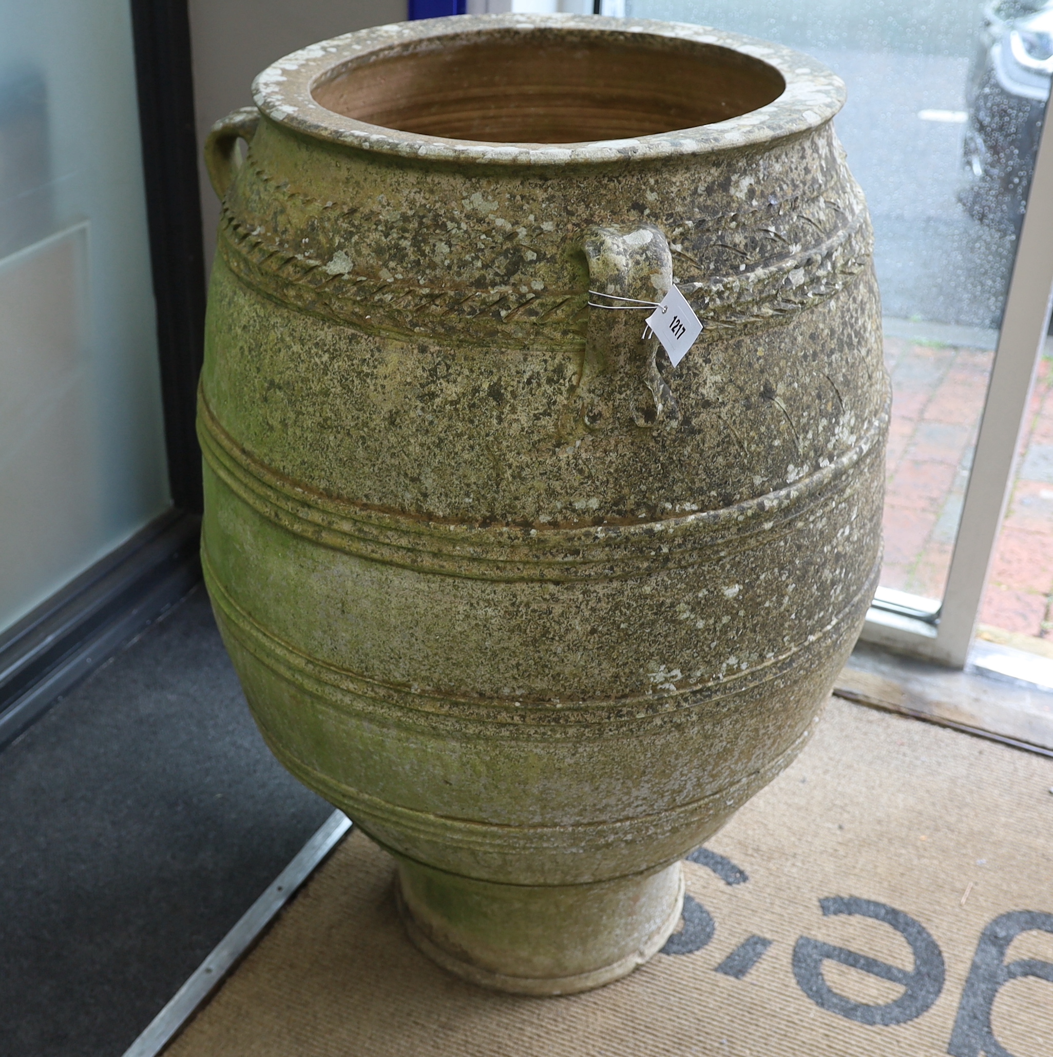 A Greek earthenware oil jar, height 100cm